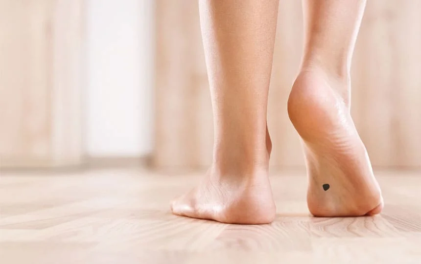 Moles on the bottom of feet meaning